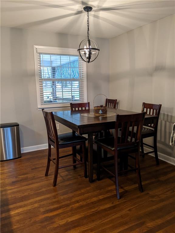 223 S Trail Butler, PA 16002 - Photo 4 of 24 a view of a dining room with furniture window and wooden floor