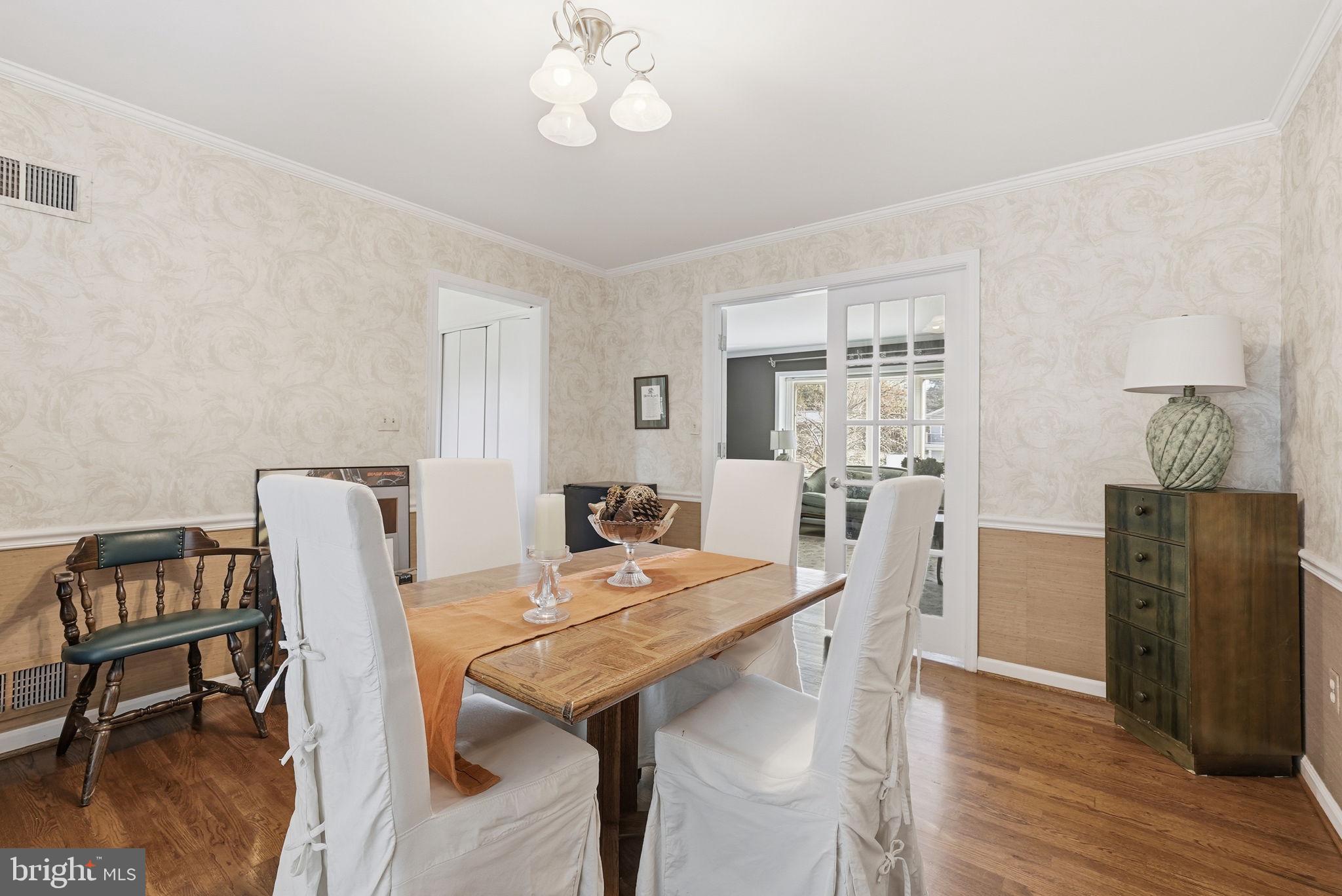 13621 North Gate Drive Silver Spring, MD 20906 - Photo 12 of 54 a view of a dining room with furniture and wooden floor