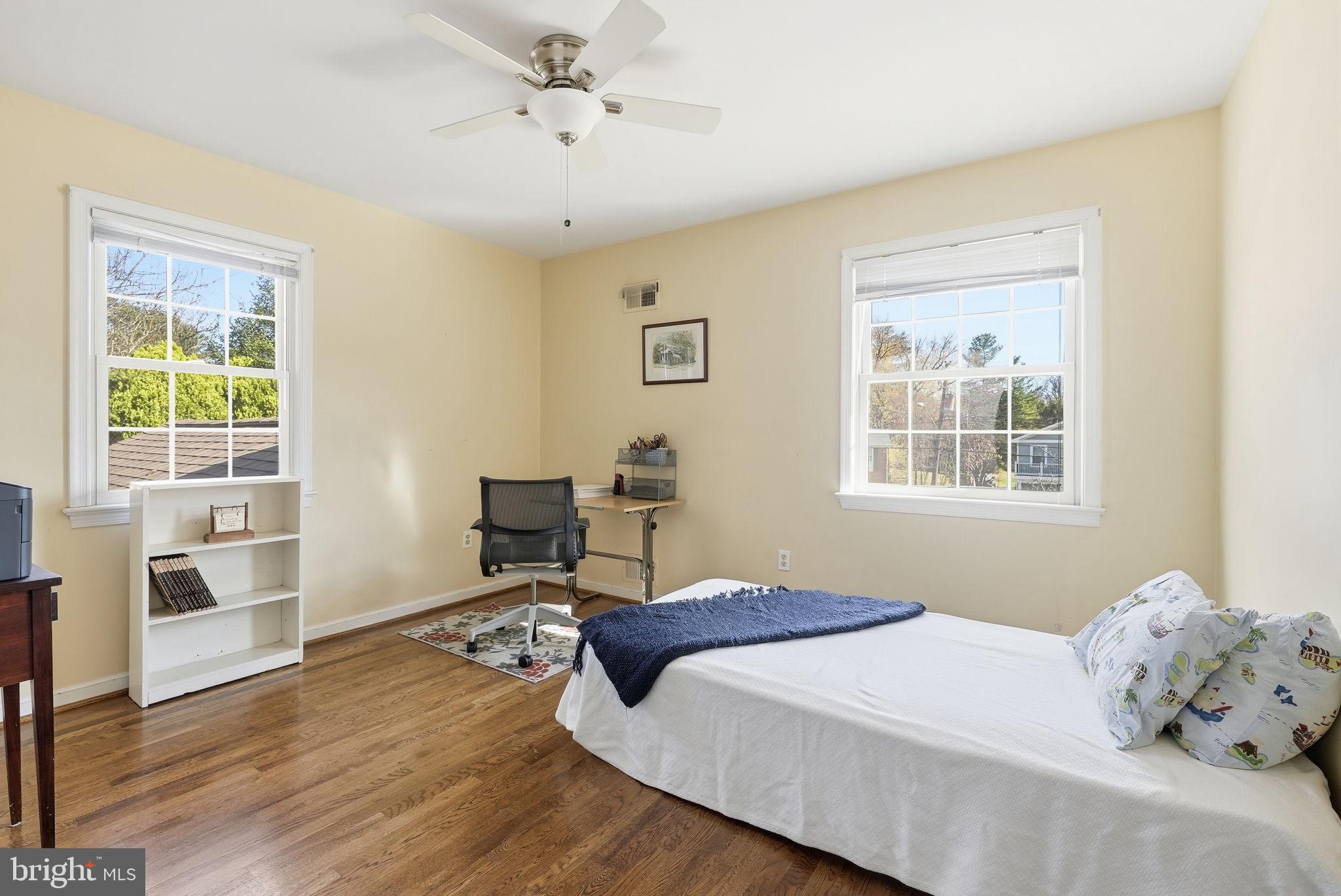 13621 North Gate Drive Silver Spring, MD 20906 - Photo 22 of 54 a bedroom with a bed and a window