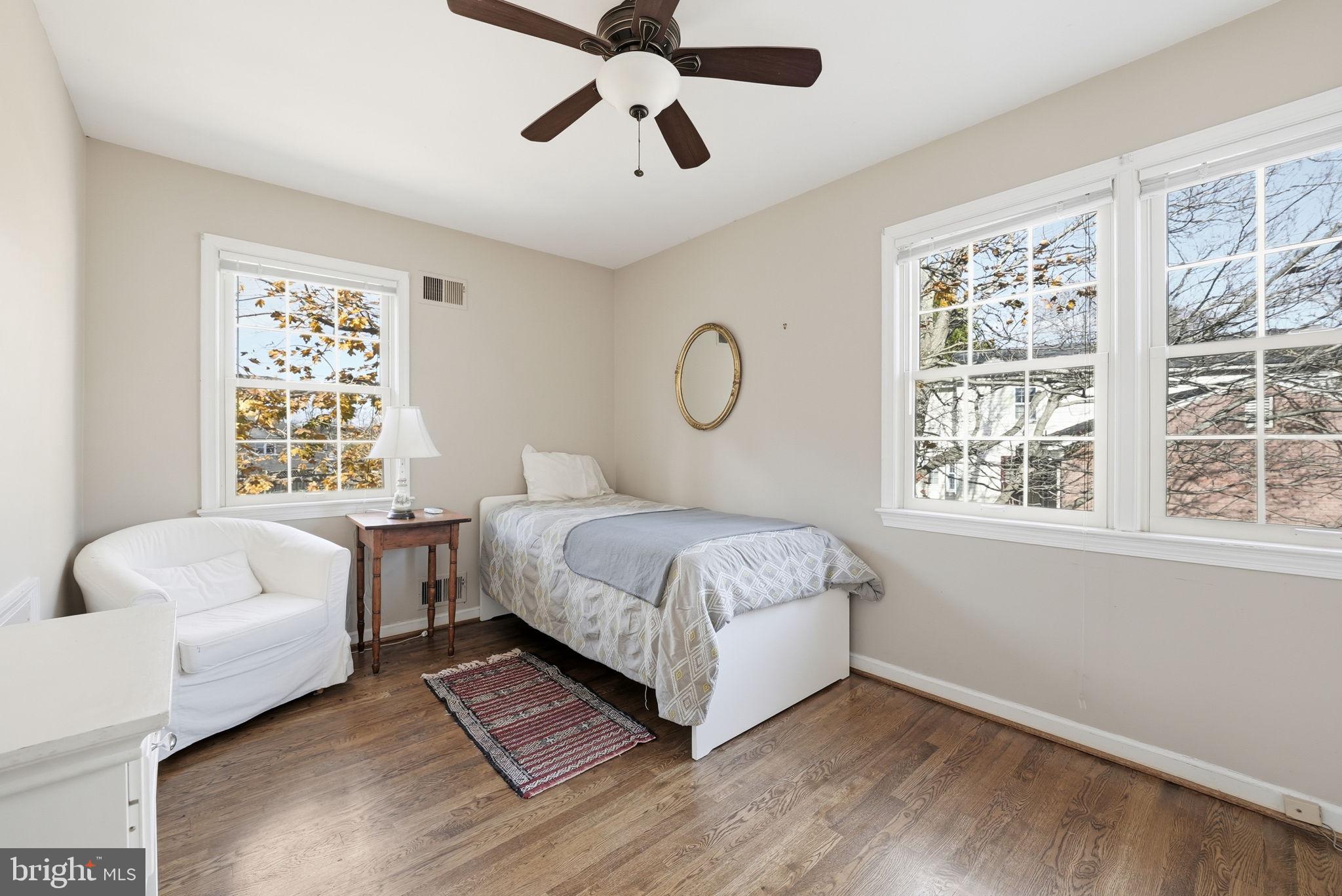 13621 North Gate Drive Silver Spring, MD 20906 - Photo 23 of 54 a bedroom with a bed and a large window