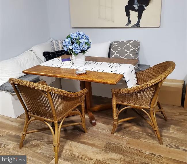 13621 North Gate Drive Silver Spring, MD 20906 - Photo 47 of 54 a view of a dining room with furniture and wooden floor