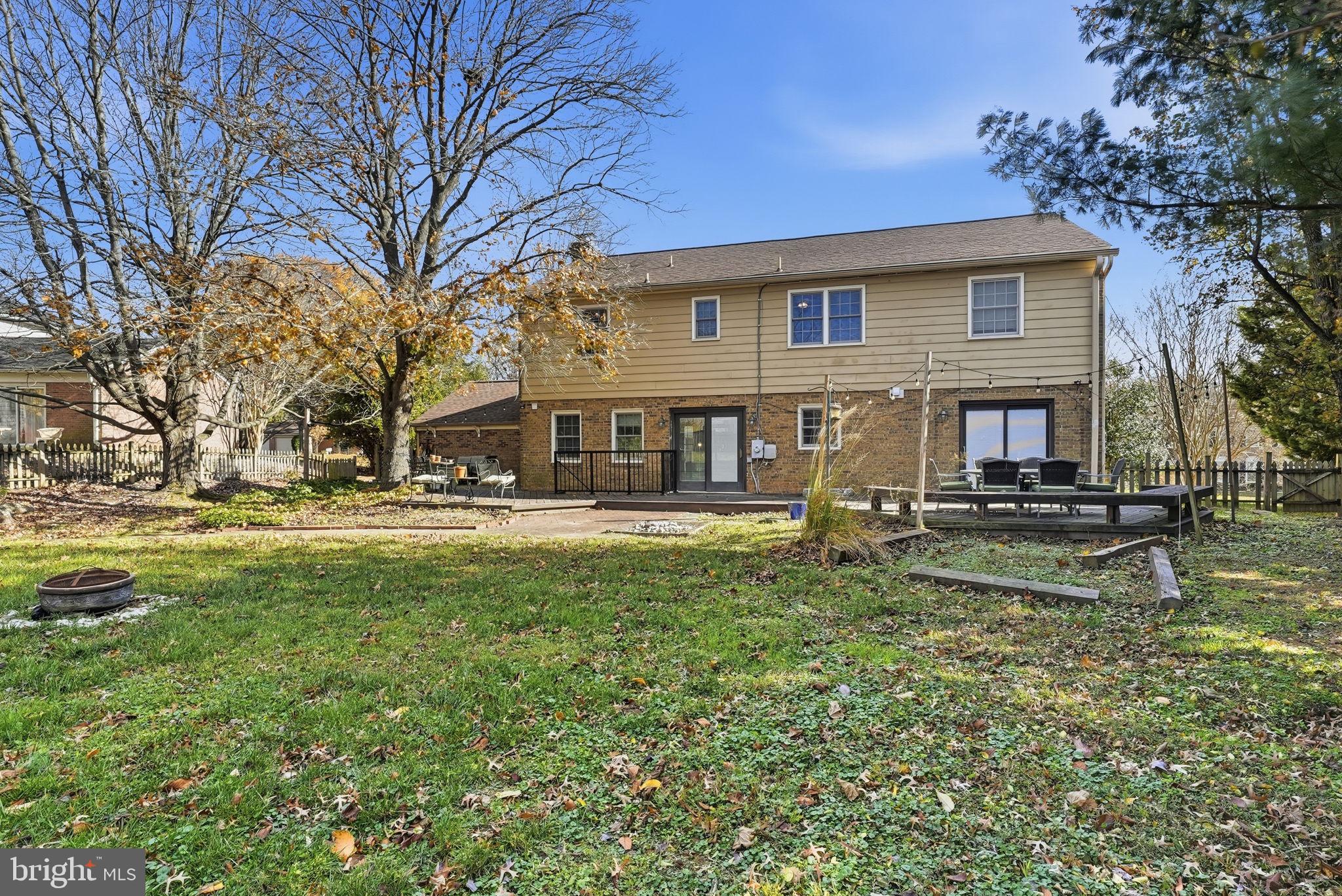 13621 North Gate Drive Silver Spring, MD 20906 - Photo 52 of 54 a view of a house with a yard