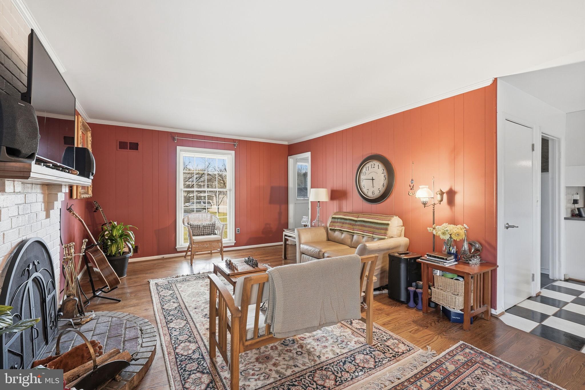 13621 North Gate Drive Silver Spring, MD 20906 - Photo 6 of 54 a living room with furniture a rug and a window