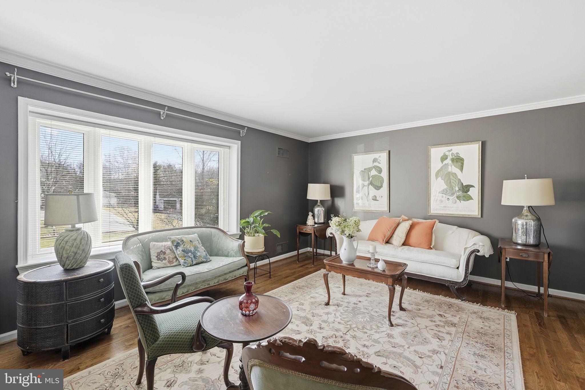 13621 North Gate Drive Silver Spring, MD 20906 - Photo 9 of 54 a living room with furniture and wooden floor