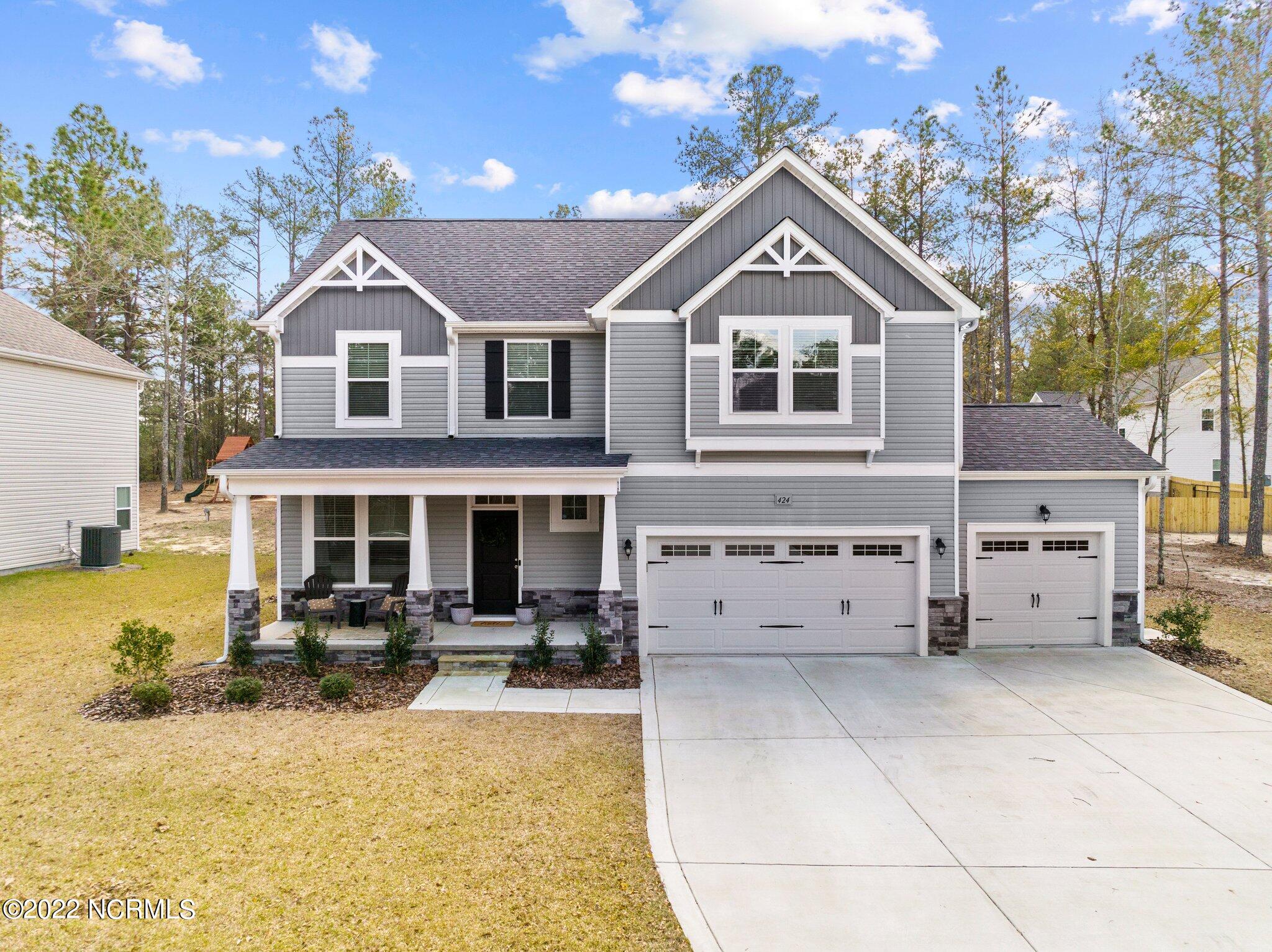 424 Mountain Run Road West End, NC 27376 - Photo 1 of 29 2-web-or-mls-DJI_0660