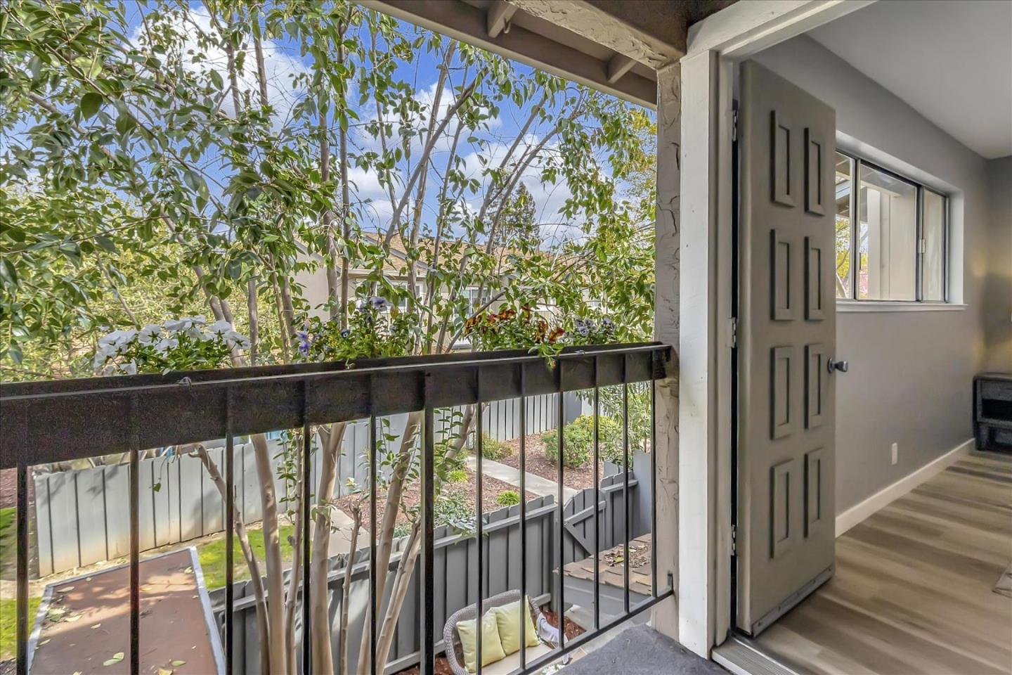 4796 Raspberry Place San Jose, CA 95129 - Photo 18 of 37 a view of balcony with floor to ceiling windows and wooden fence