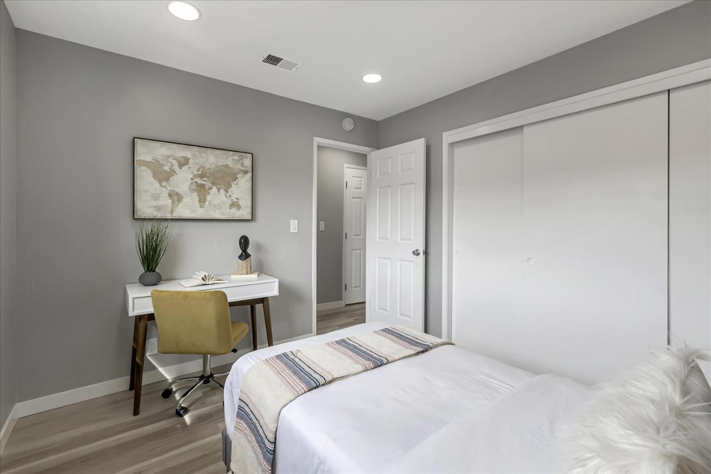 4796 Raspberry Place San Jose, CA 95129 - Photo 20 of 37 a bedroom with a bed and a table in it