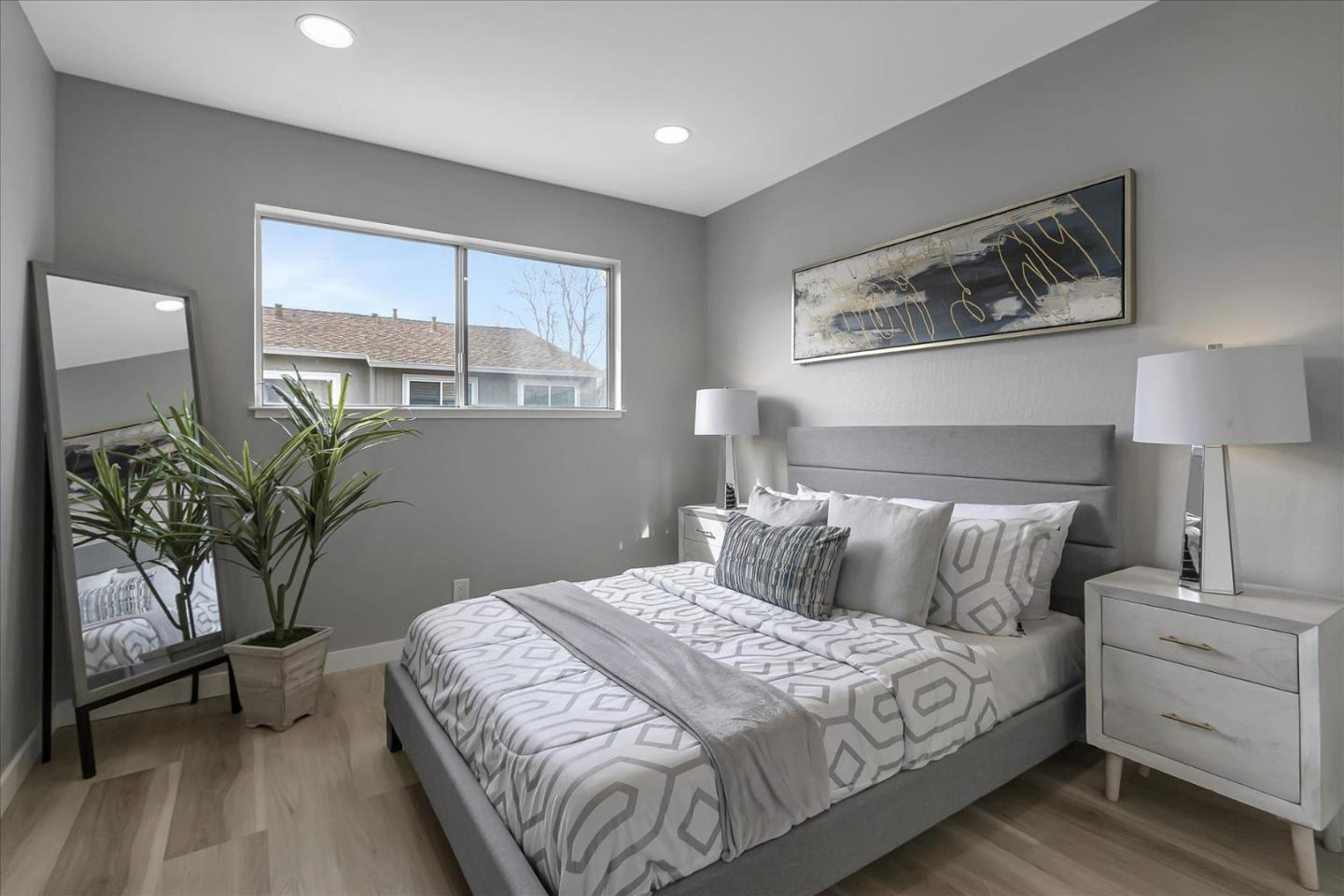 4796 Raspberry Place San Jose, CA 95129 - Photo 21 of 37 a bedroom with a bed table and a window