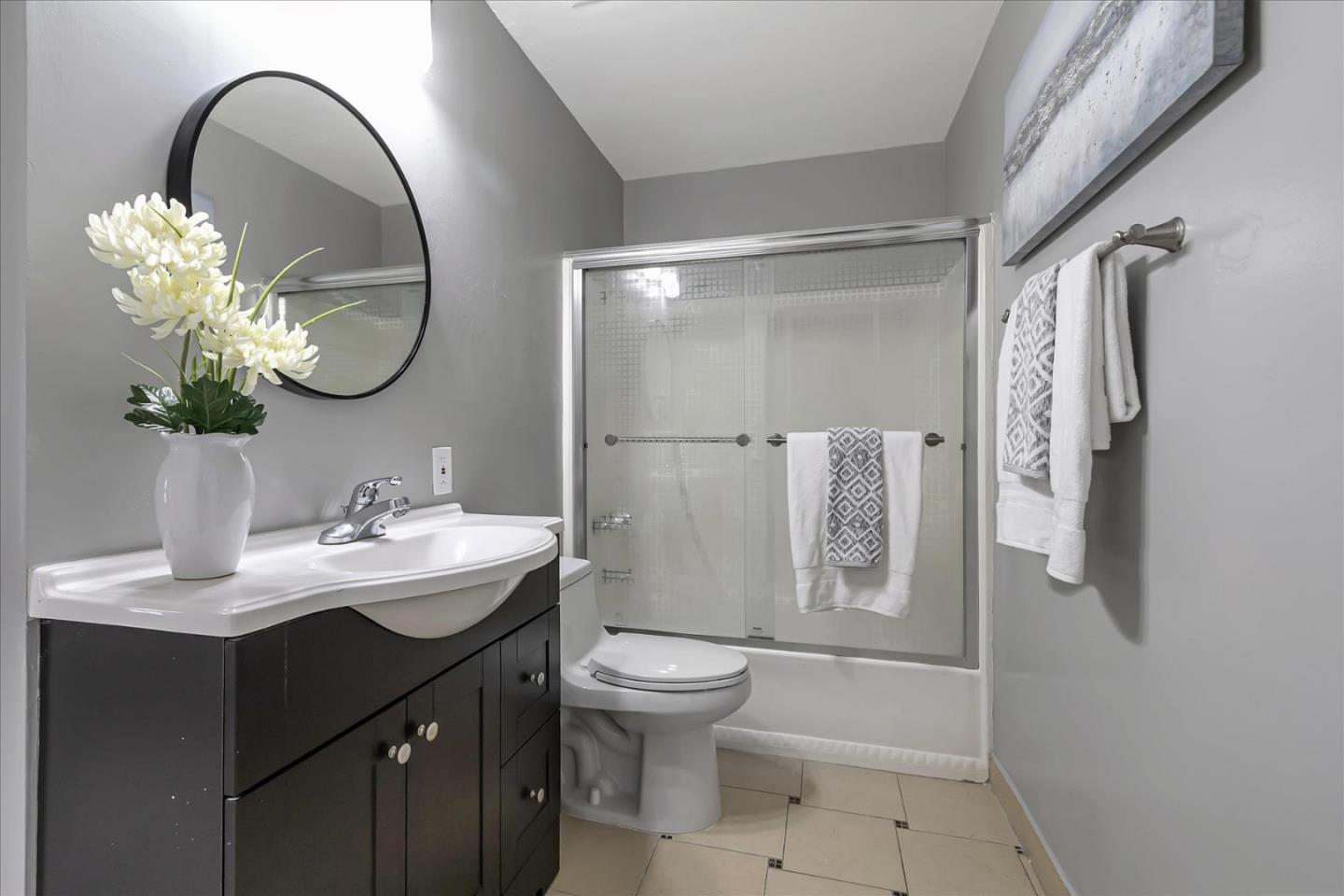 4796 Raspberry Place San Jose, CA 95129 - Photo 25 of 37 a bathroom with a toilet sink and shower