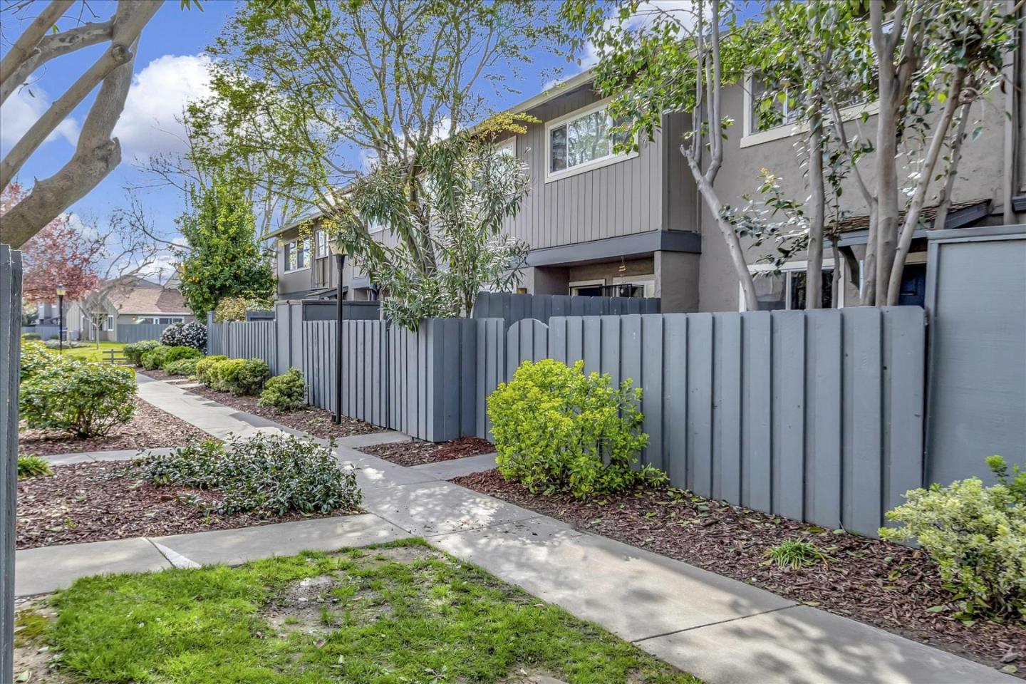4796 Raspberry Place San Jose, CA 95129 - Photo 29 of 37 a front view of a house having garden