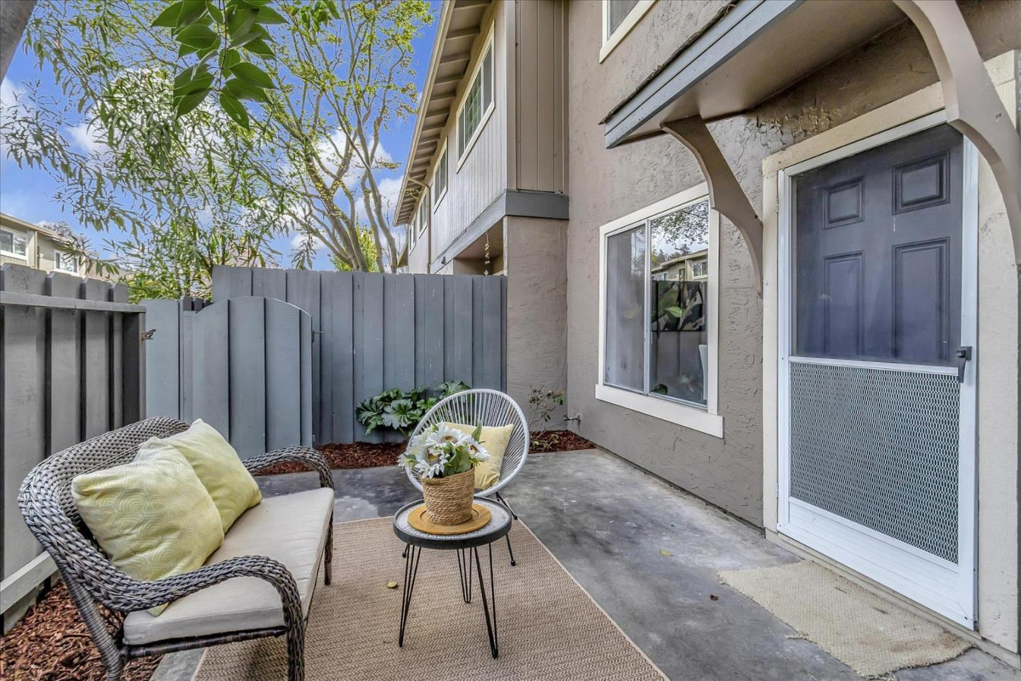 4796 Raspberry Place San Jose, CA 95129 - Photo 30 of 37 a backyard of a house with table and chairs