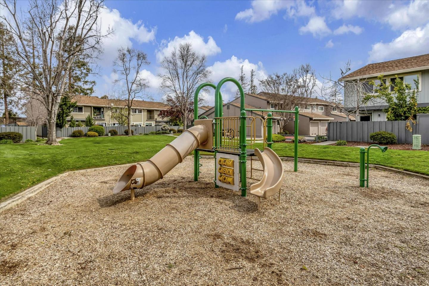 4796 Raspberry Place San Jose, CA 95129 - Photo 35 of 37 a view of a house with a backyard and a slide