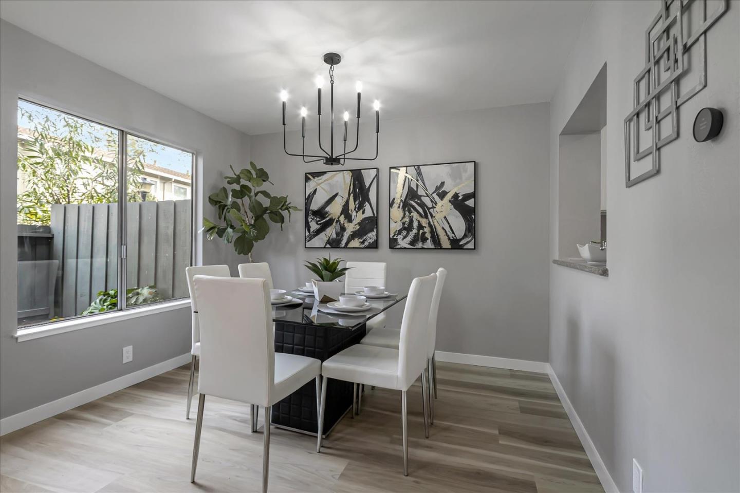 4796 Raspberry Place San Jose, CA 95129 - Photo 6 of 37 a view of a dining room with furniture window and outside view