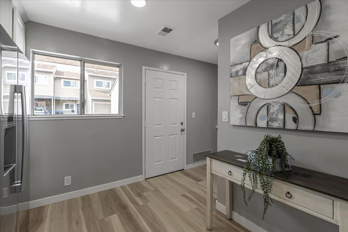 4796 Raspberry Place San Jose, CA 95129 - Photo 9 of 37 a view of entryway with wooden floor