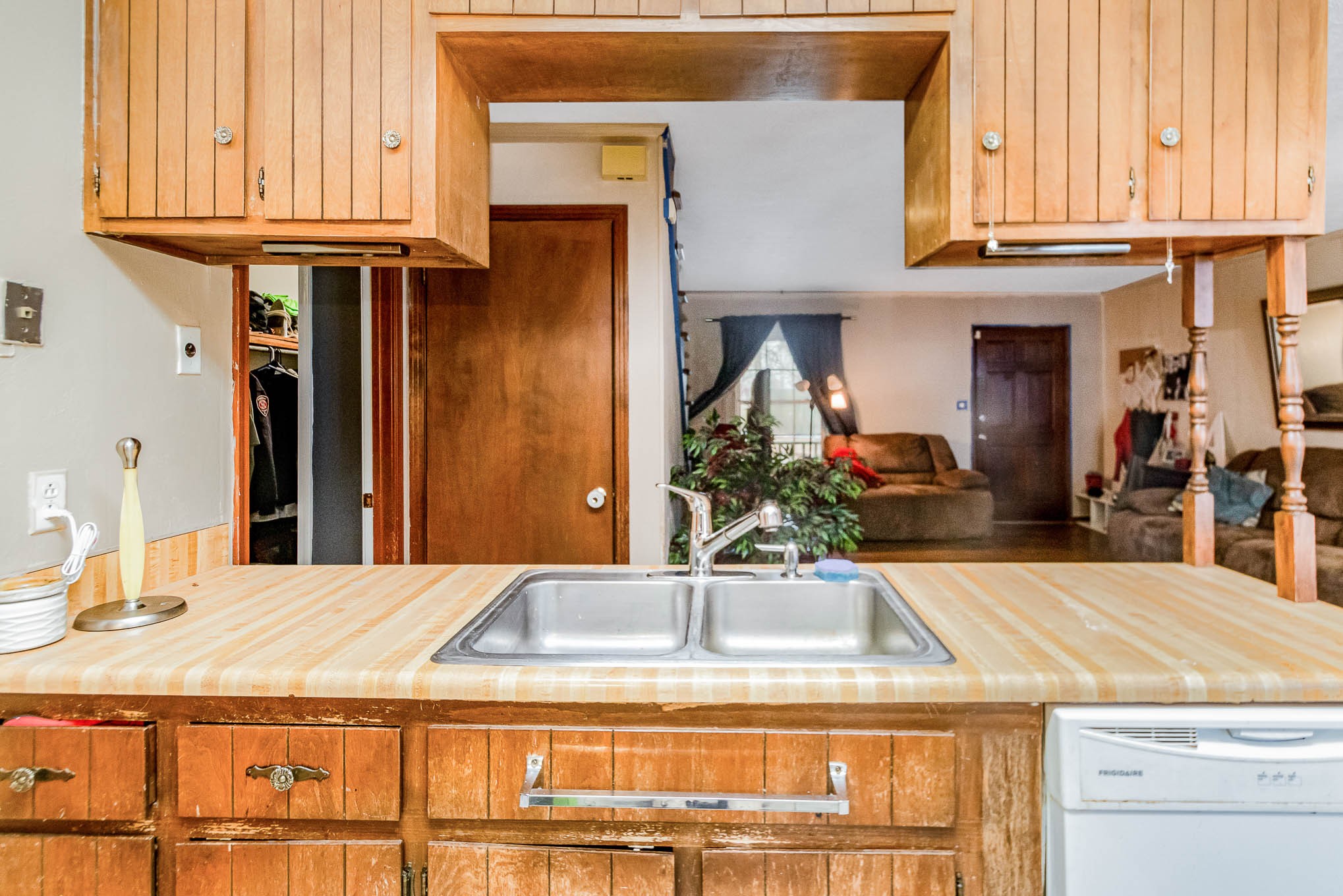 1531 Tom Moore Road Clarksville, TN 37043 - Photo 11 of 30 a kitchen with a sink and a refrigerator