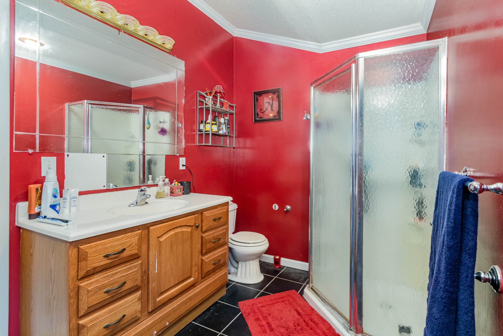 1531 Tom Moore Road Clarksville, TN 37043 - Photo 16 of 30 a bathroom with a sink toilet vanity and shower