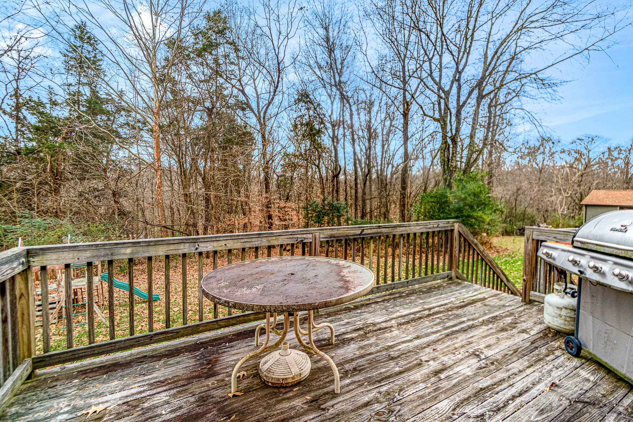 1531 Tom Moore Road Clarksville, TN 37043 - Photo 25 of 30 a view of balcony with wooden floor and outdoor seating