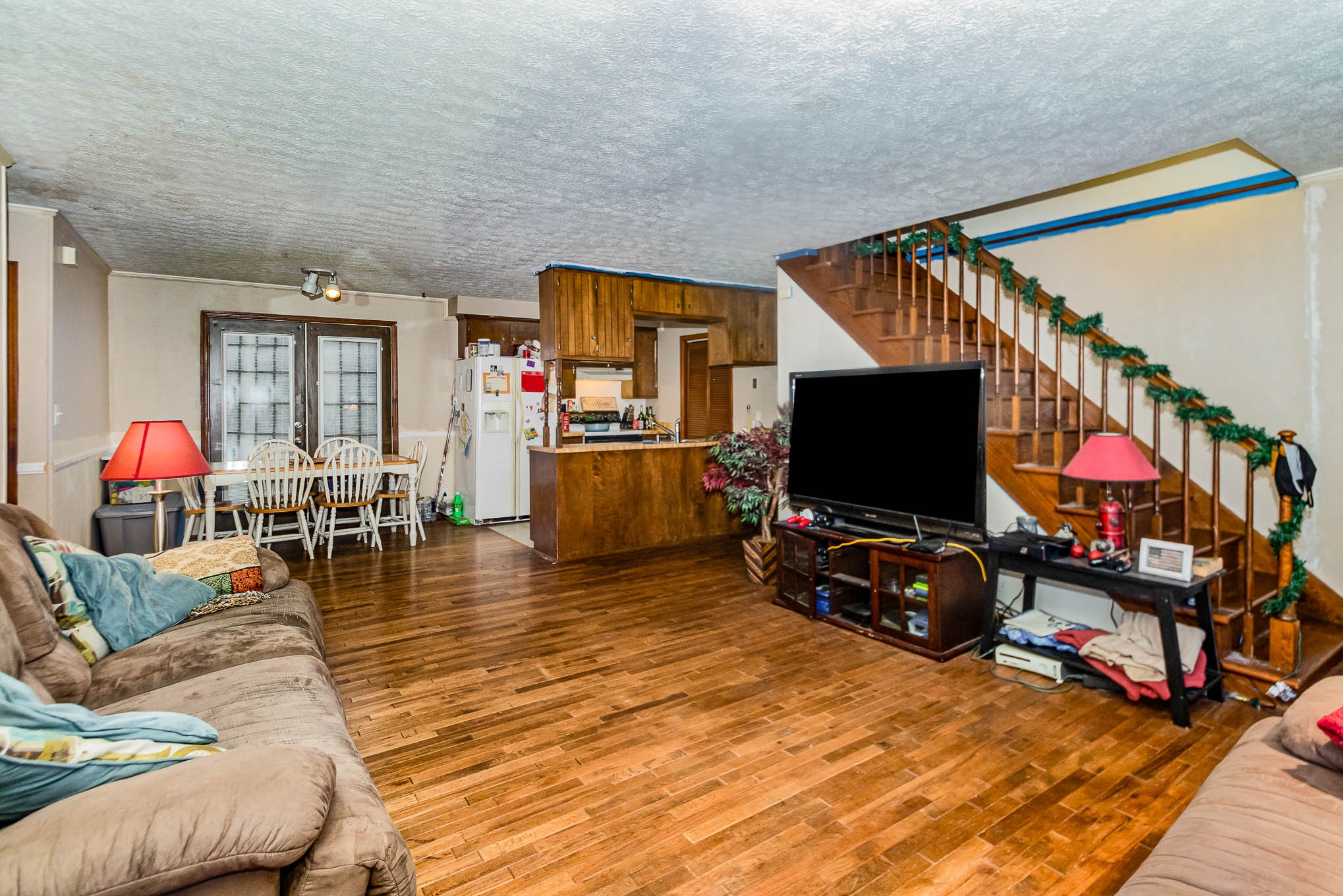 1531 Tom Moore Road Clarksville, TN 37043 - Photo 6 of 30 a living room with furniture and a flat screen tv