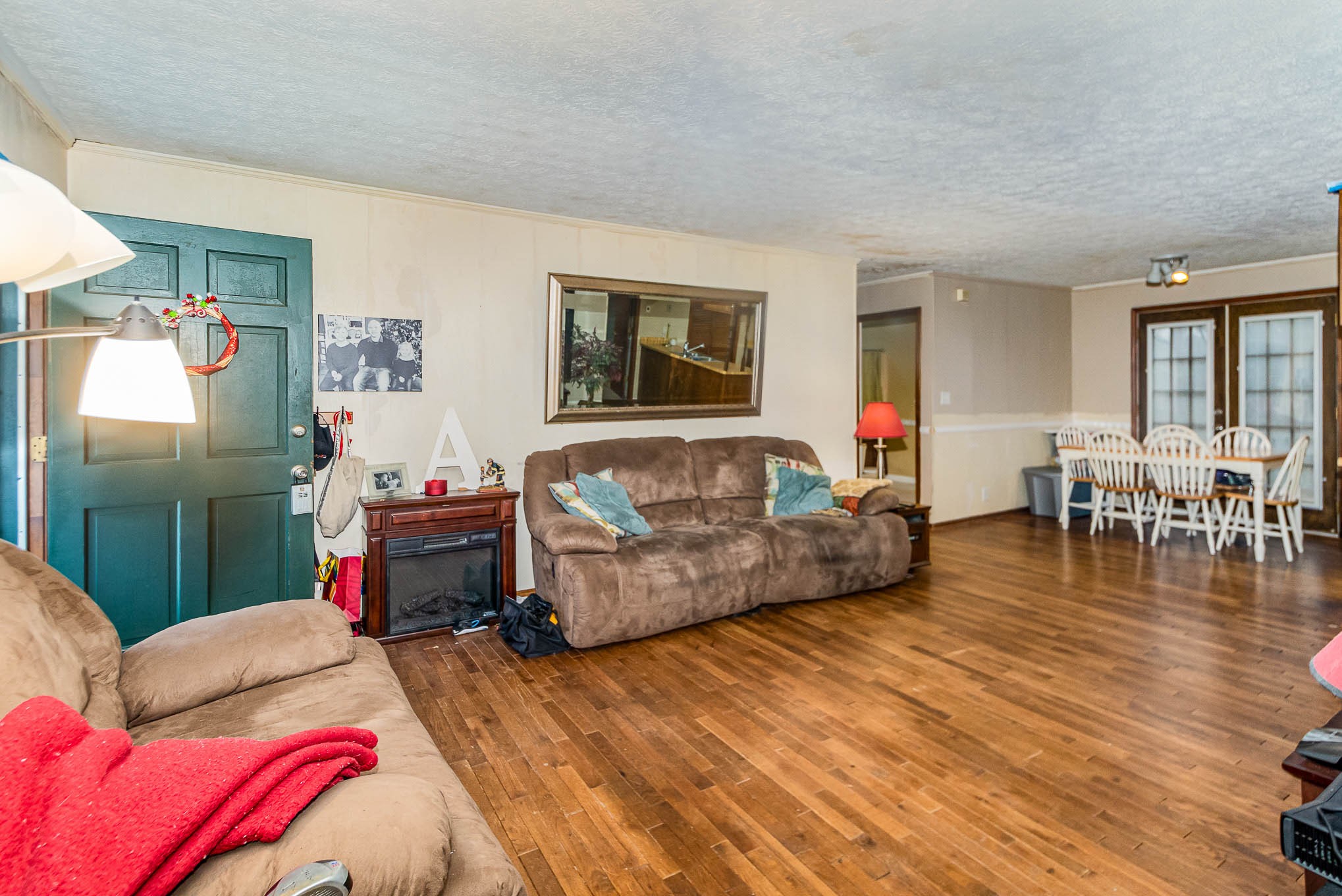 1531 Tom Moore Road Clarksville, TN 37043 - Photo 7 of 30 a living room with furniture and wooden floor