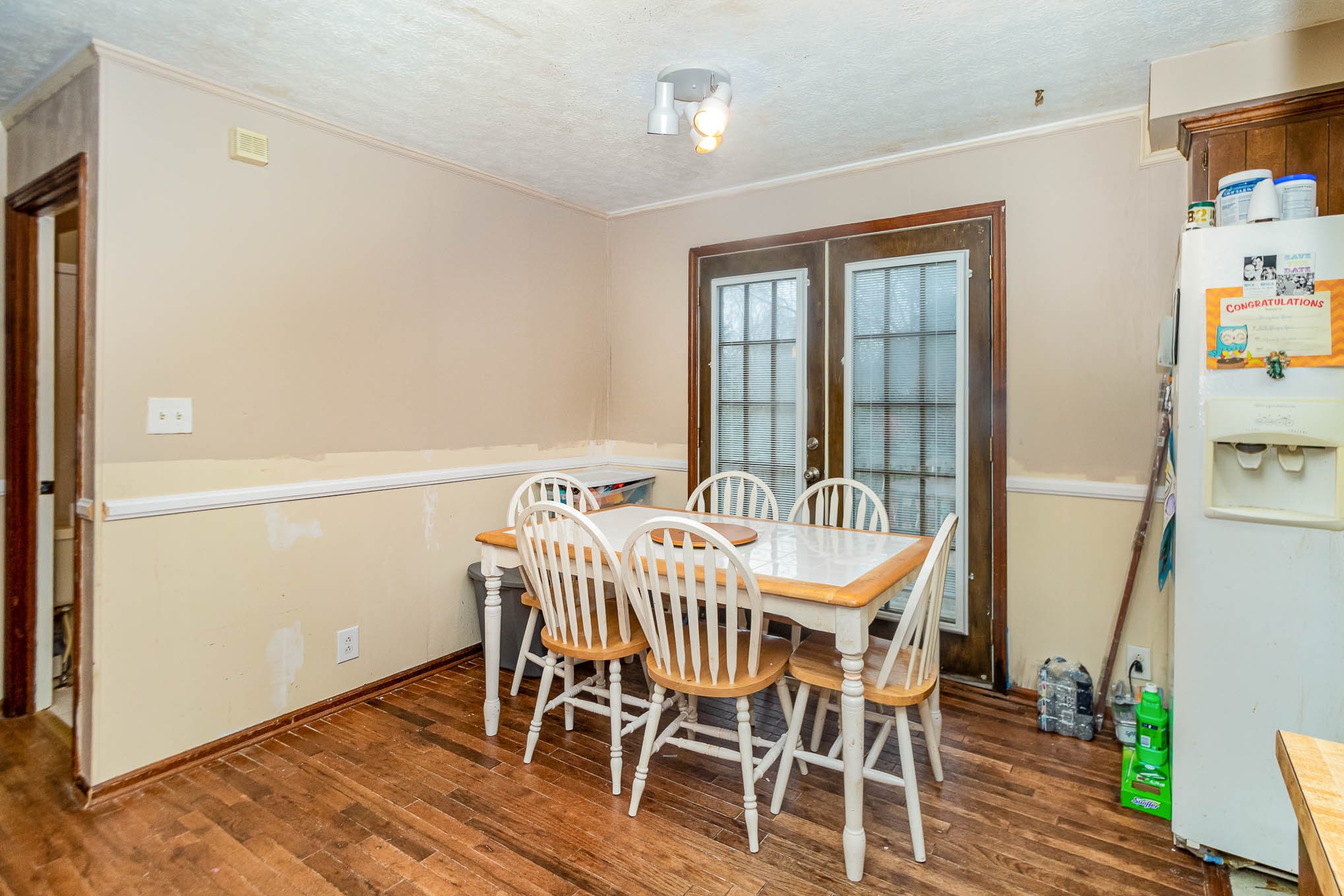 1531 Tom Moore Road Clarksville, TN 37043 - Photo 8 of 30 a dining room with furniture and wooden floor