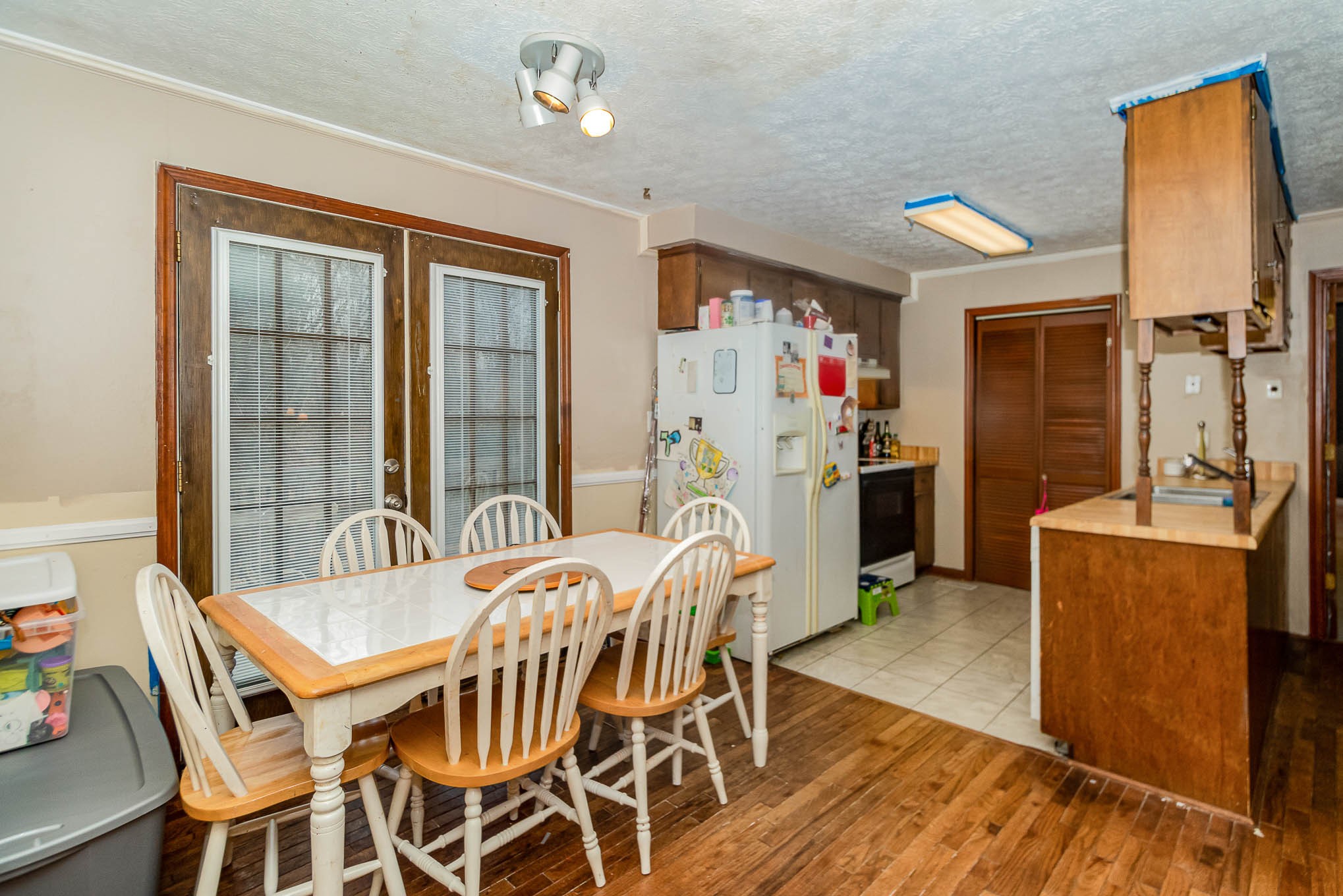 1531 Tom Moore Road Clarksville, TN 37043 - Photo 9 of 30 a view of a dining room with furniture window and wooden floor