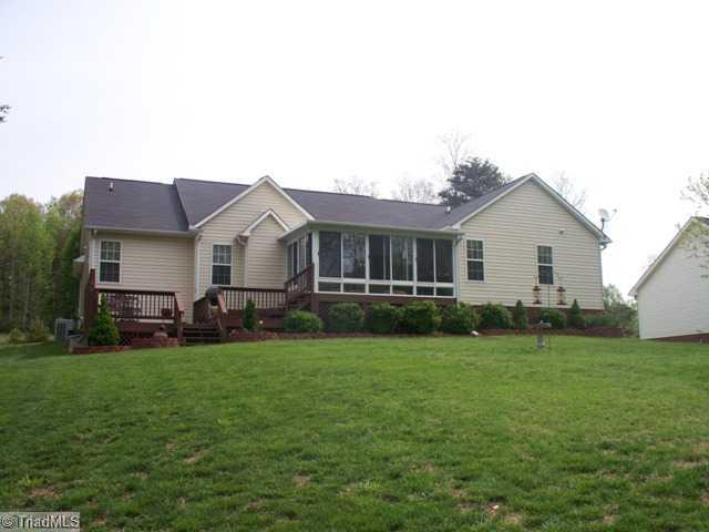 7515 Kristen Drive Oak Ridge, NC 27310 - Photo 3 of 16 Exterior Back.