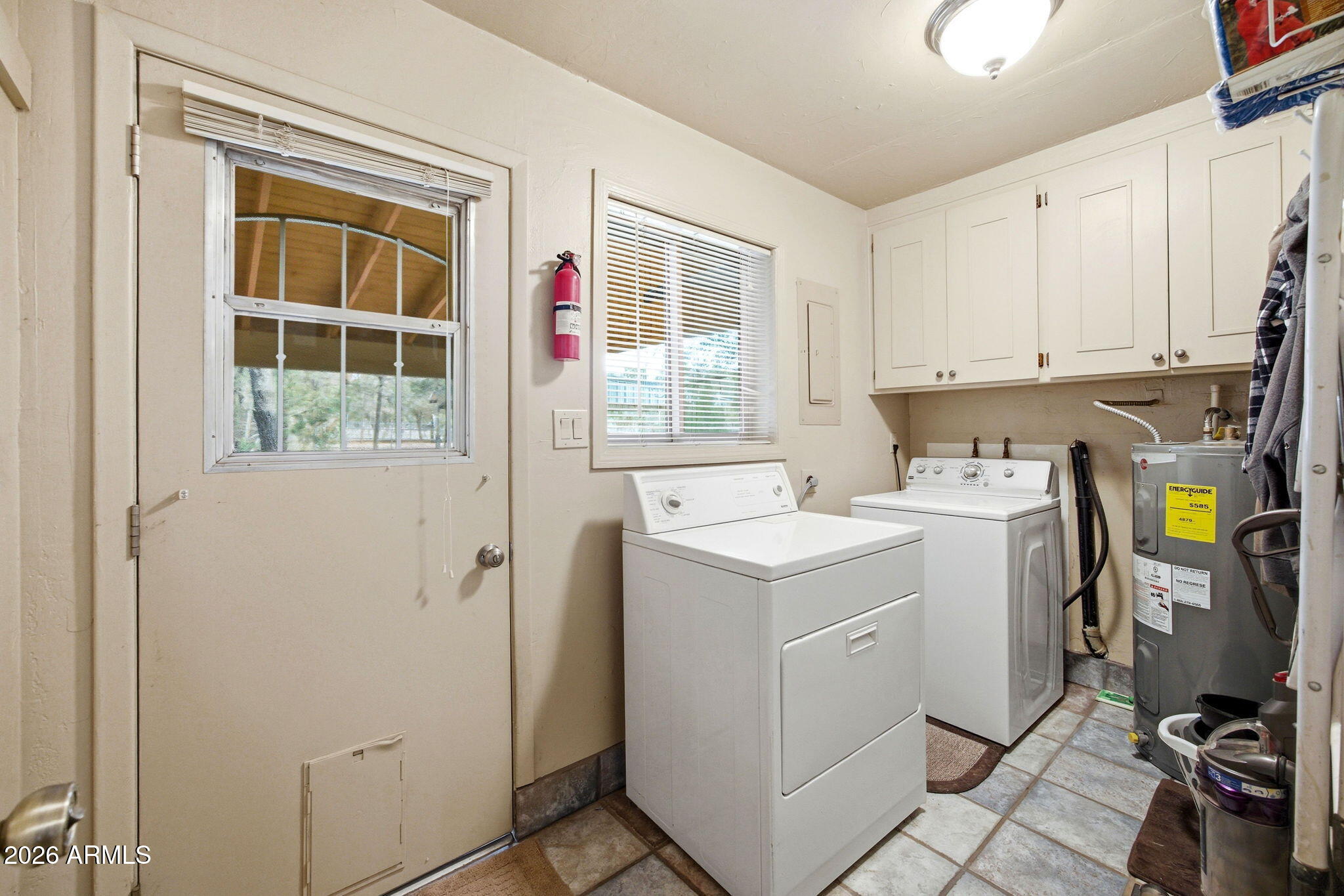 3072 Chevelon Road Overgaard, AZ 85933 - Photo 20 of 51 a utility room with dryer and washer