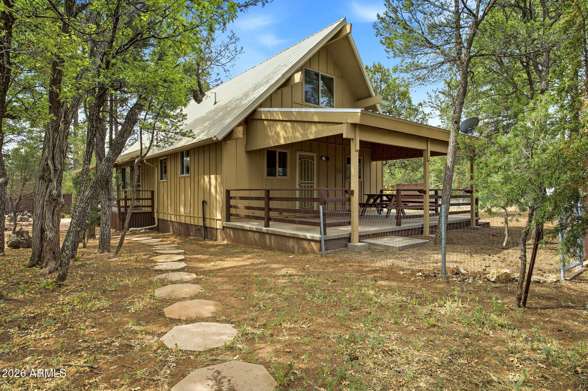 3072 Chevelon Road Overgaard, AZ 85933 - Photo 21 of 51 a view of a house with a patio