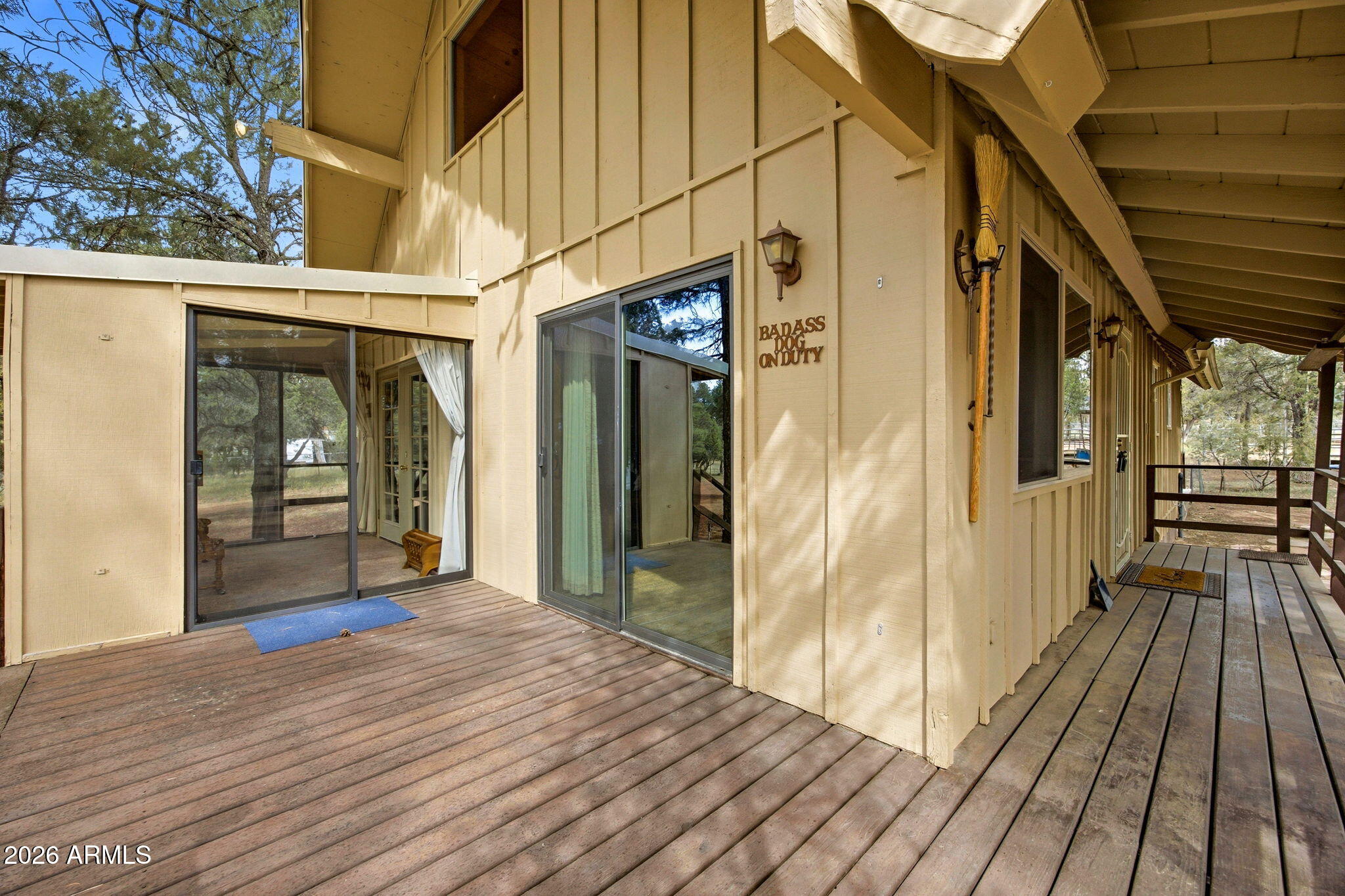 3072 Chevelon Road Overgaard, AZ 85933 - Photo 23 of 51 a view of a porch with wooden floor and furniture
