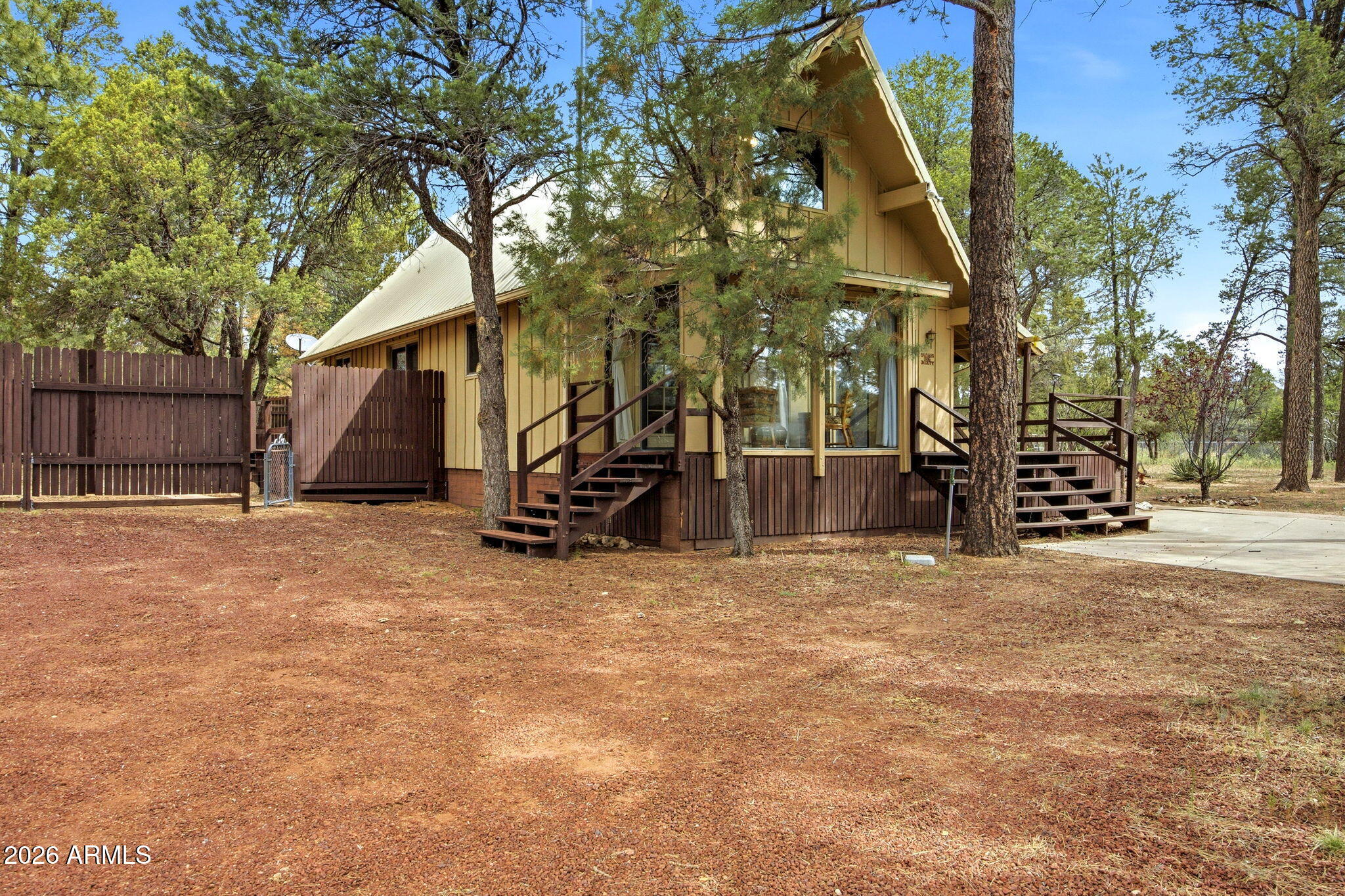 3072 Chevelon Road Overgaard, AZ 85933 - Photo 25 of 51 a view of a house with a yard