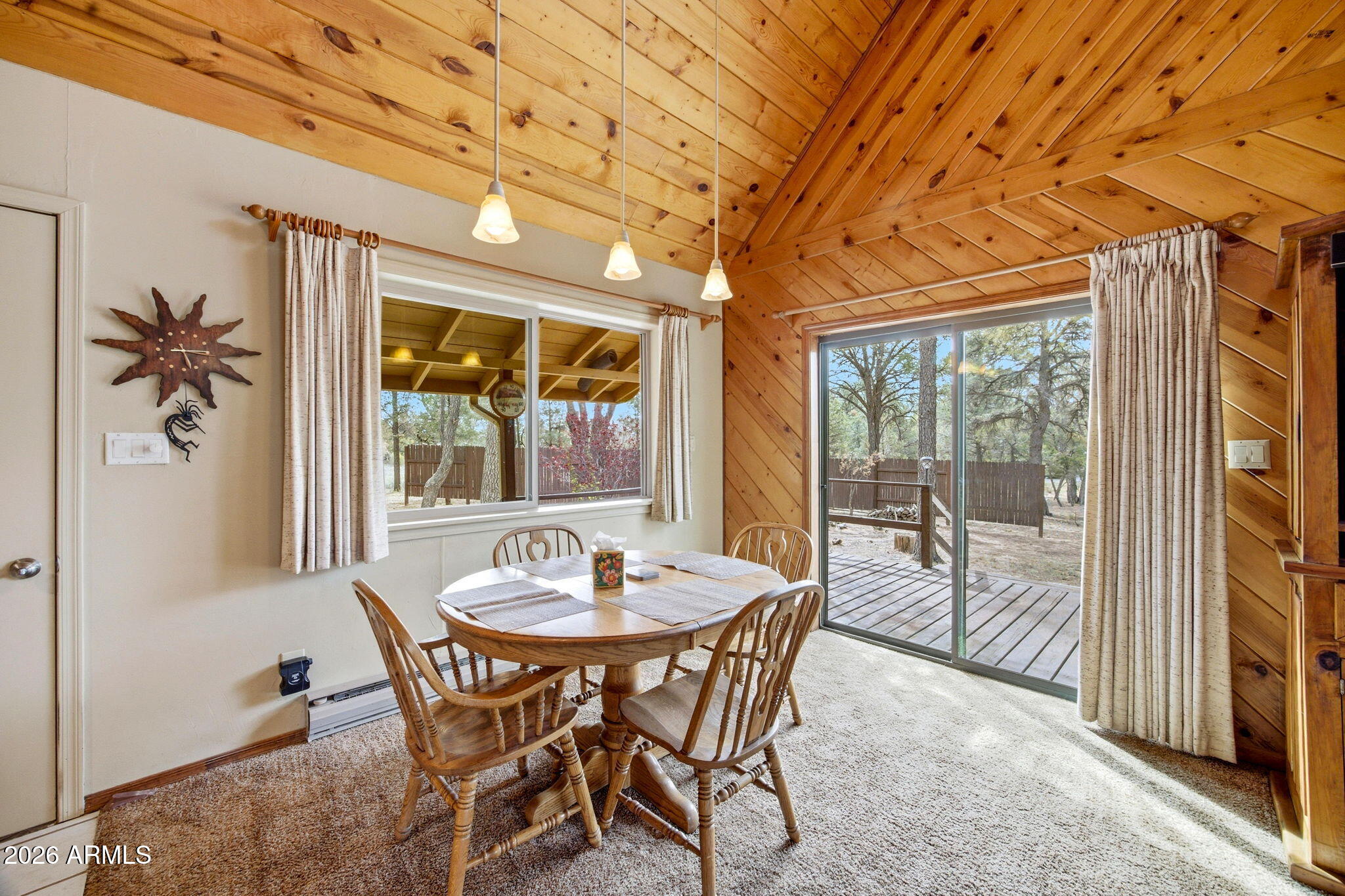 3072 Chevelon Road Overgaard, AZ 85933 - Photo 3 of 51 a view of a dining room with furniture window and outside view