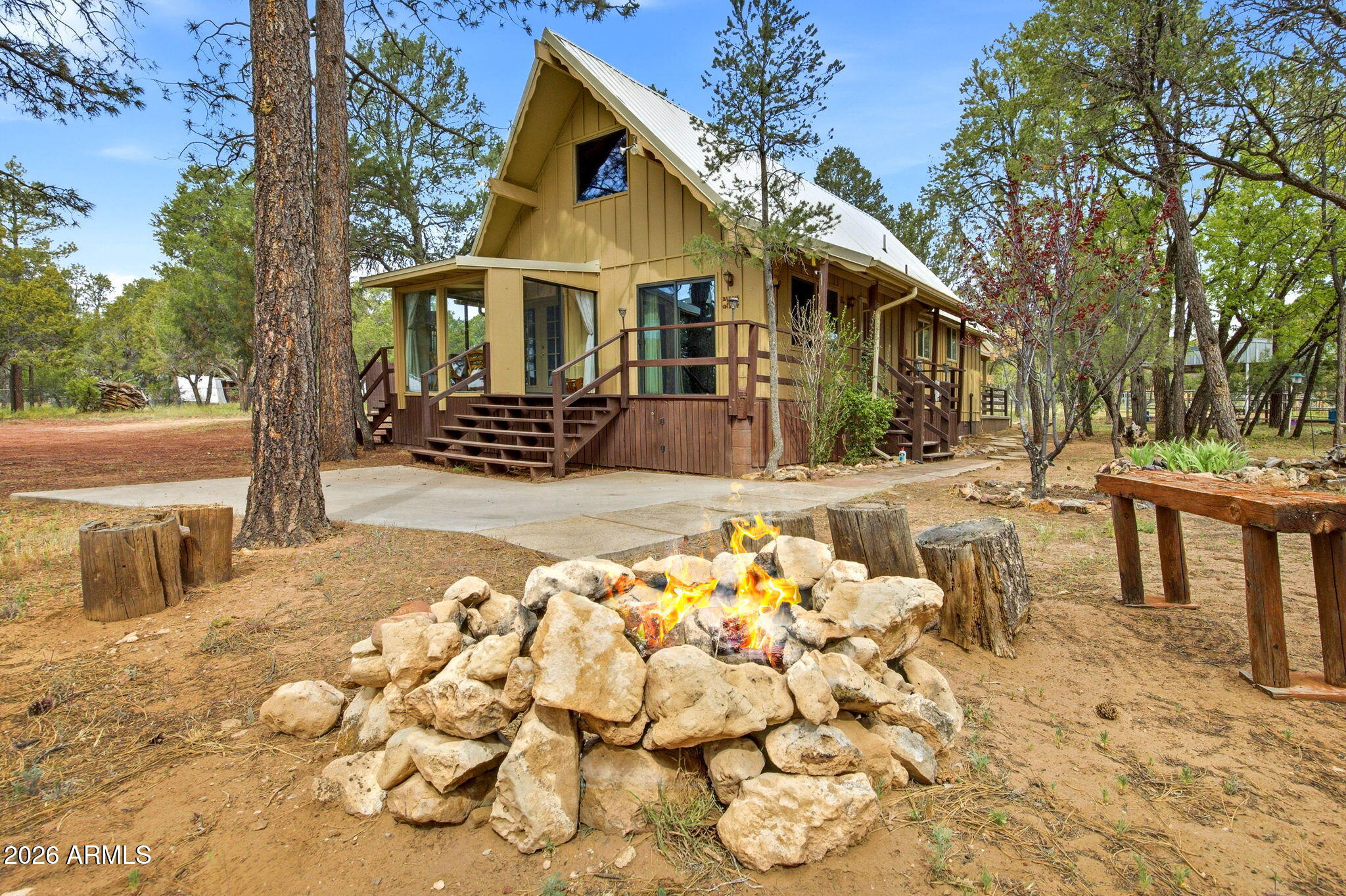 3072 Chevelon Road Overgaard, AZ 85933 - Photo 43 of 51 a front view of a house with a yard