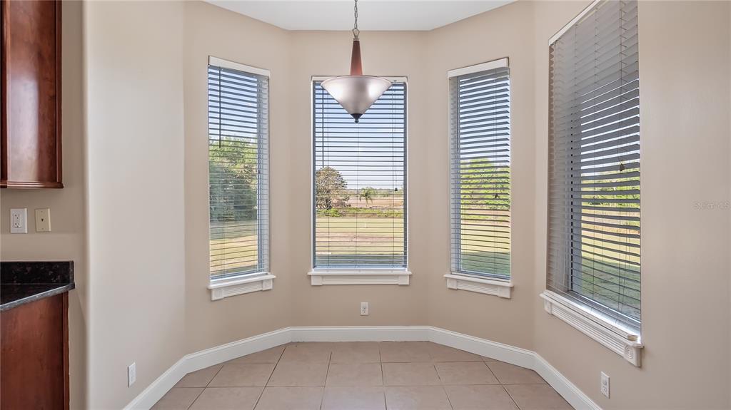 10651 Arrowtree Boulevard Clermont, FL 34715 - Photo 21 of 51 a view of an empty room with a window