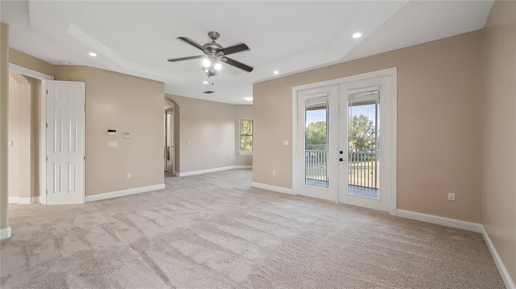 10651 Arrowtree Boulevard Clermont, FL 34715 - Photo 26 of 51 a view of an empty room with a window