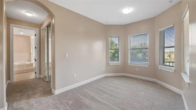 a view of a bathroom with a glass door shower
