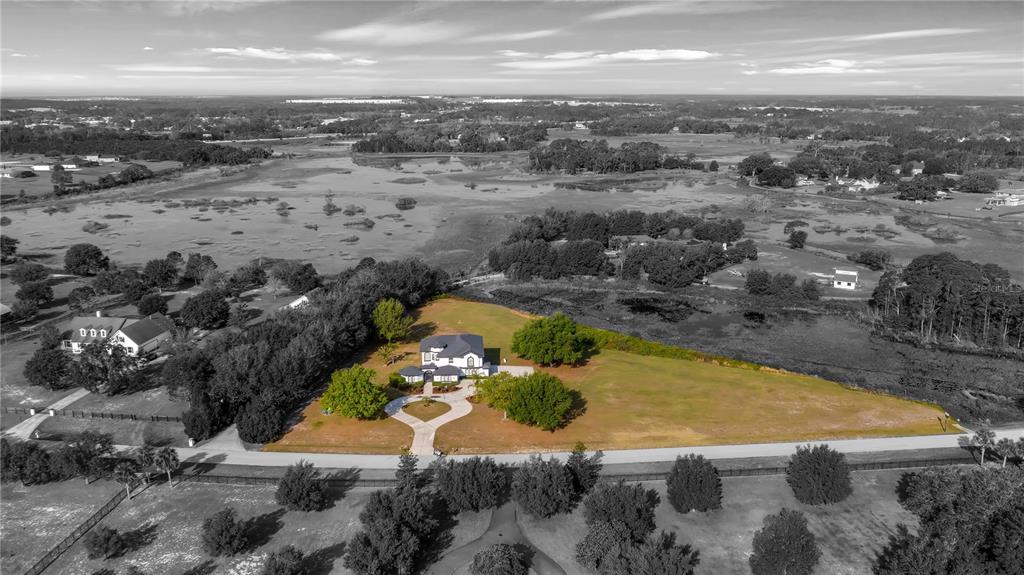 10651 Arrowtree Boulevard Clermont, FL 34715 - Photo 3 of 51 an aerial view of residential houses with outdoor space