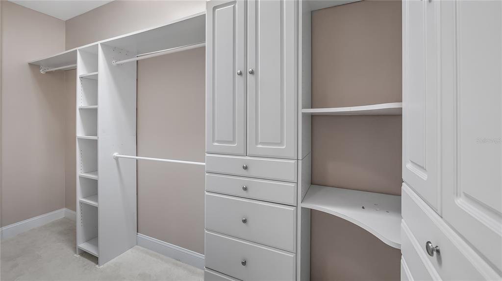 10651 Arrowtree Boulevard Clermont, FL 34715 - Photo 35 of 51 a view of an empty walk in closet