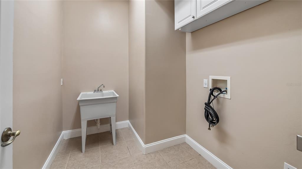 10651 Arrowtree Boulevard Clermont, FL 34715 - Photo 45 of 51 a bathroom with a shower and toilet