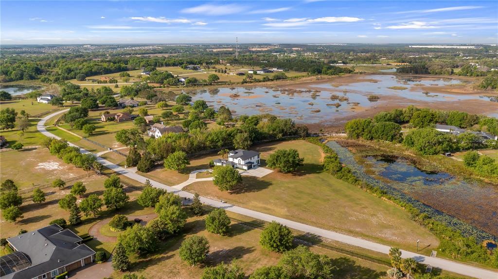 10651 Arrowtree Boulevard Clermont, FL 34715 - Photo 47 of 51 an aerial view of beach and city space