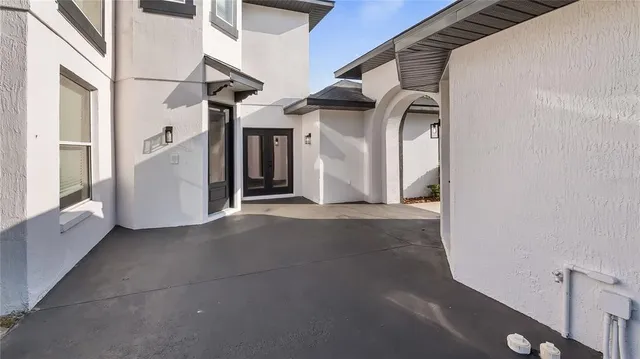 a view of a house with a road