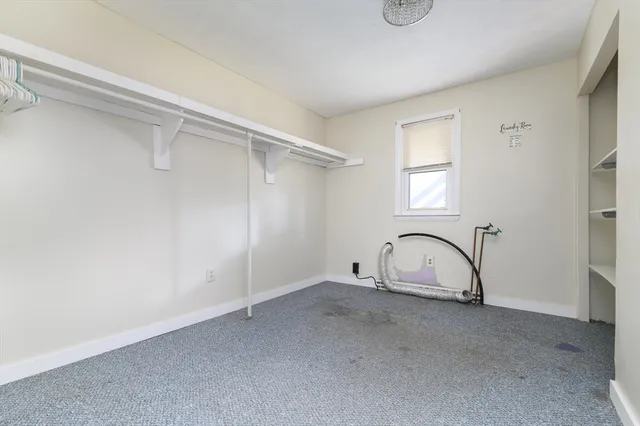 a view of a room with racks on the wall