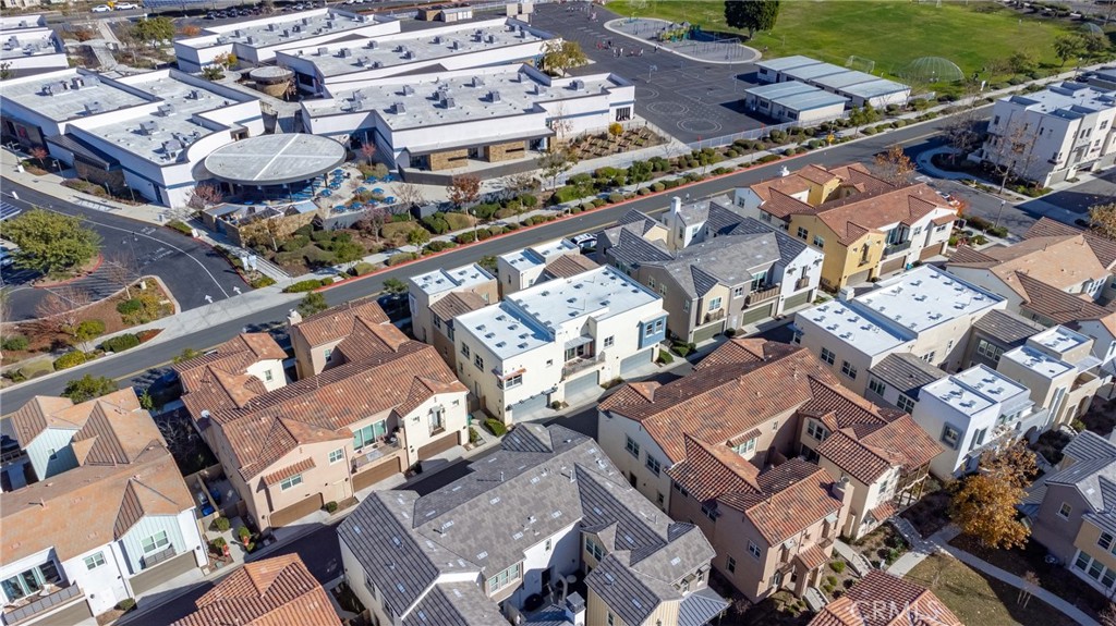 168 Paramount Irvine, CA 92618 - Photo 2 of 3 an aerial view of a residential building with an outdoor space