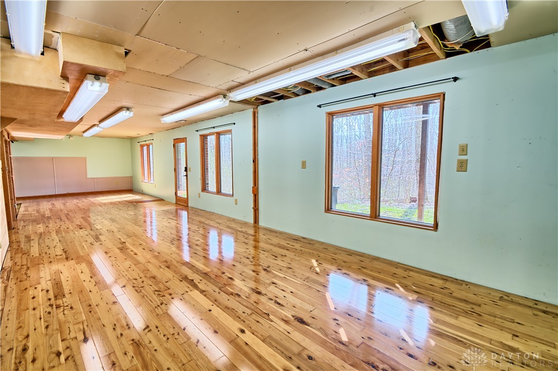 8711 Nicole Lane Springboro, OH 45066 - Photo 69 of 87 This spacious area offers bright natural light and polished wooden floors, perfect for any dynamic living arrangement.