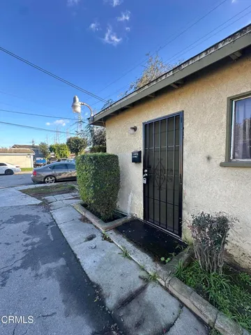 a house view with a backyard space