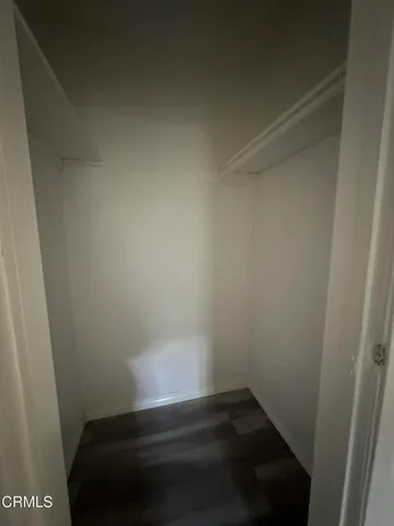 a empty room with a bench