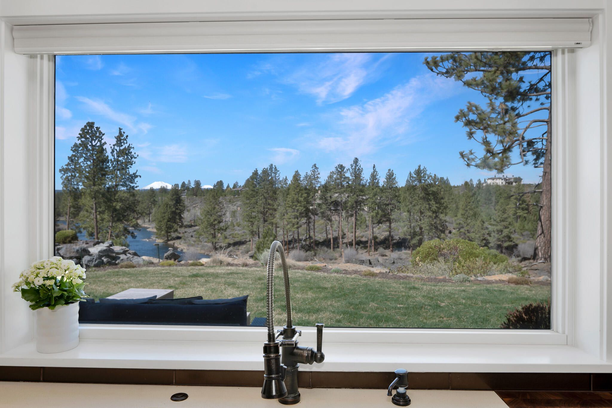 60871 River Rim Drive Bend, OR 97702 - Photo 13 of 42 a view of a bench in balcony