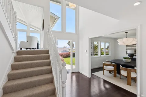 a kitchen with a sink and stove top oven