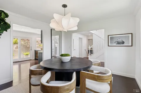 a stove top oven sitting inside of a kitchen