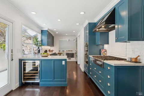 a view of workspace with wooden floor