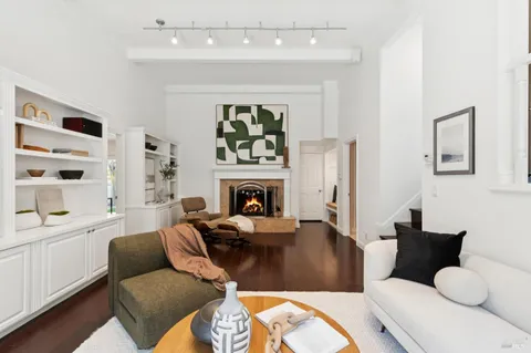 a large white bed in a white room